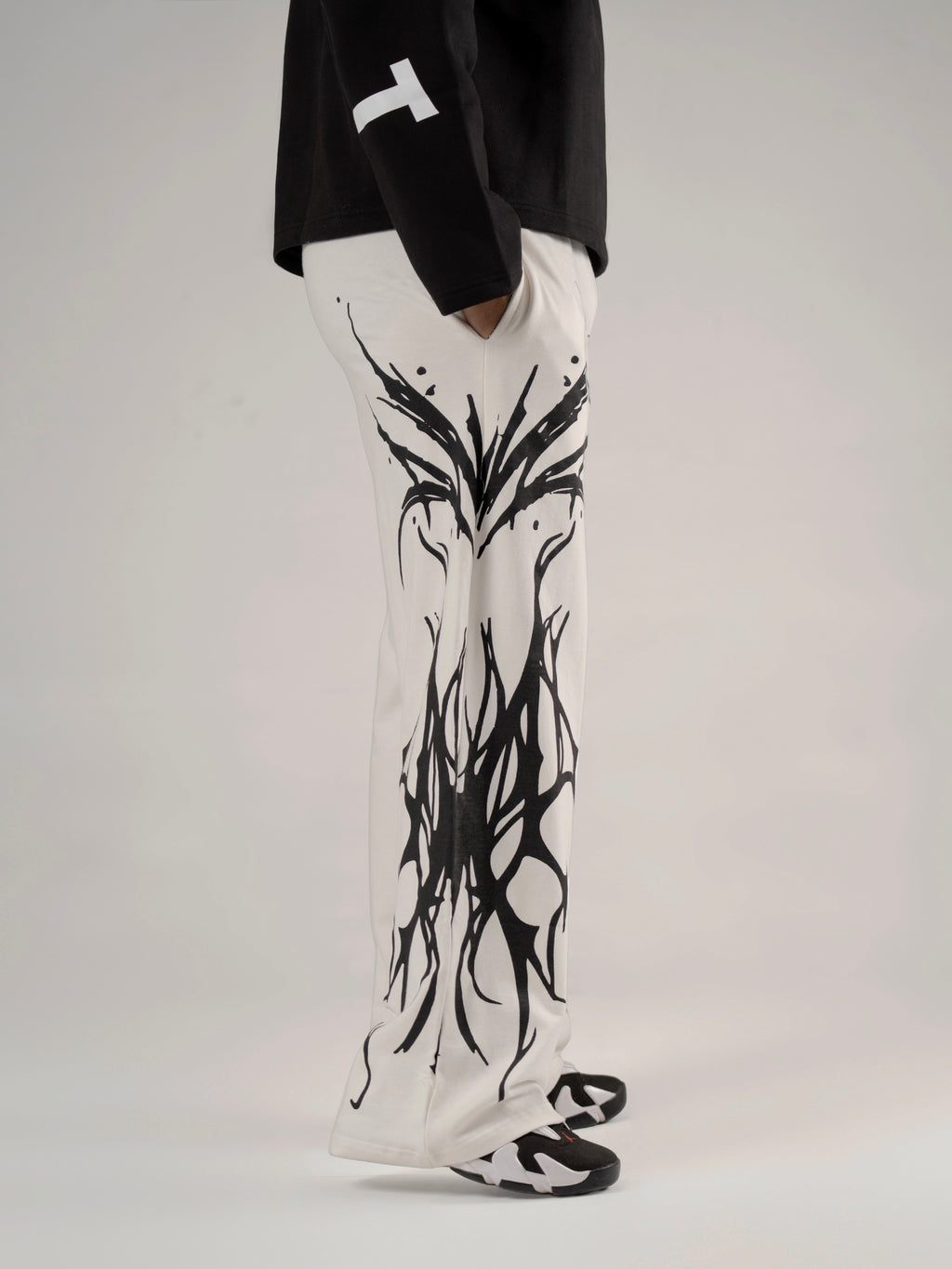 ALONSH UNISEX BAGGY TRACK PANTS – NUEIR ( WHITE)